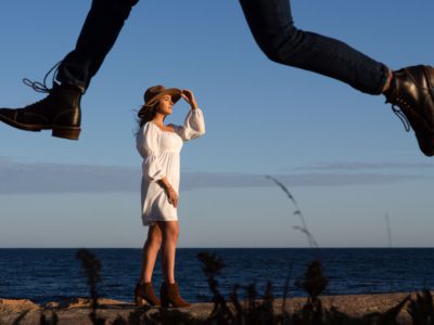 a couple taking photos with their RI engagement photographer