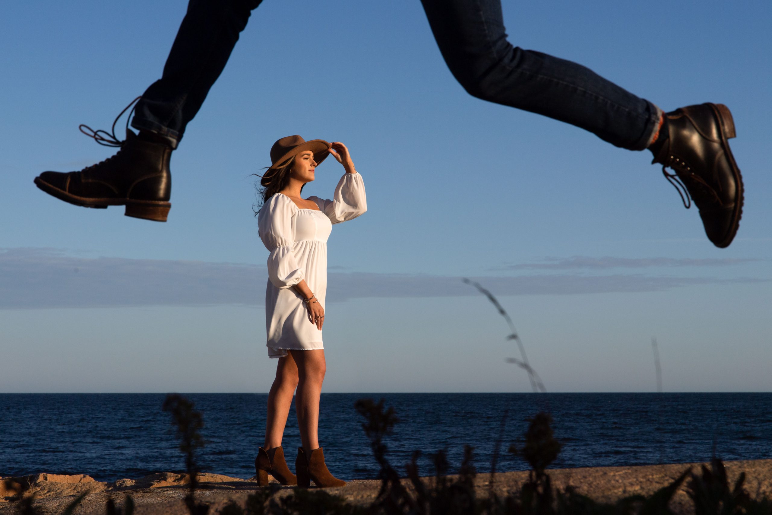 a couple taking photos with their RI engagement photographer