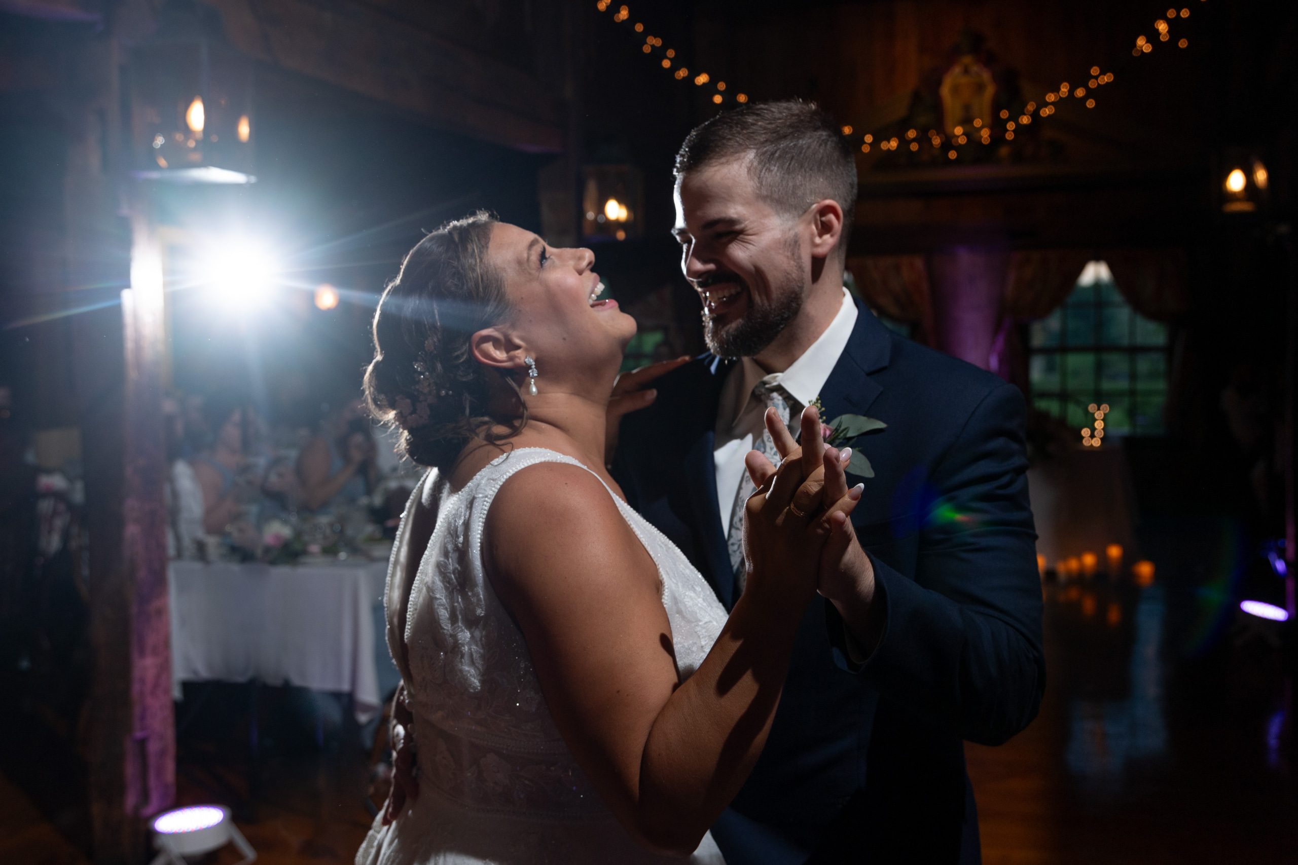 A Bride and Groom dance at their wedding